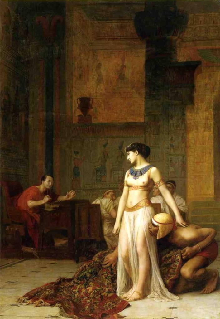 lukisan yang menggambarkan Cleopatra VII keluar dari gulungan permadani untuk menemui Julius Caesar secara sembunyi-sembunyi ©1866 Jean-Léon Gérôme